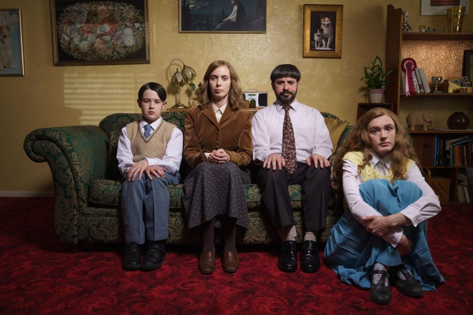 Harry Connor, Kate O'Flynn, Simon Bird, and Amy James-Kelly looking straight at the camera.