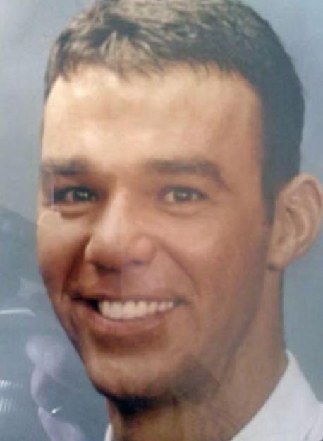 Robert Darby, a man with short brown hair, smiling.