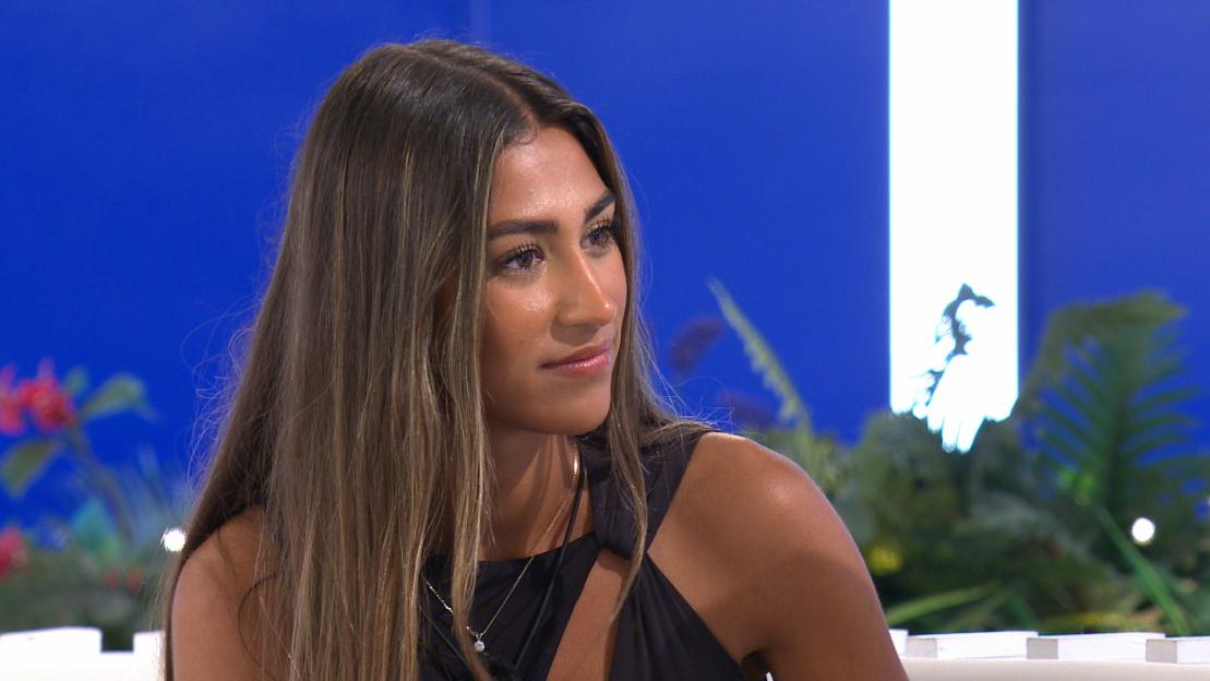 Priya from Love Island looking to the right.