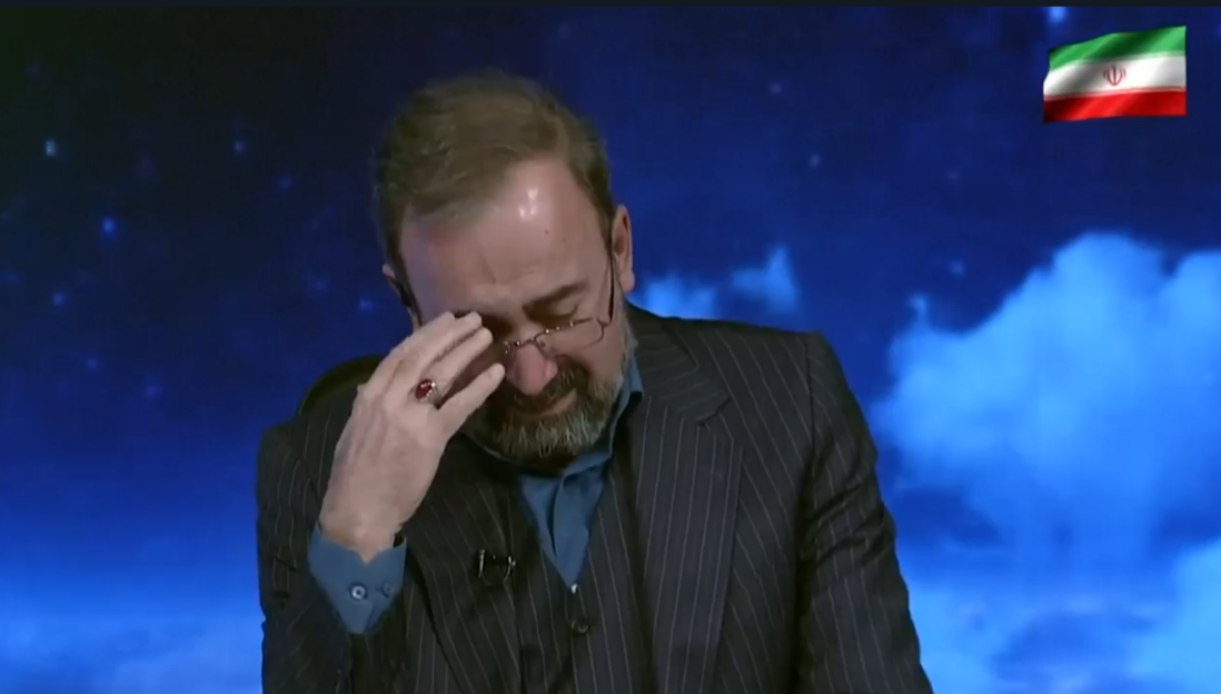 An Iranian state TV presenter crying on air as he announces the death of the Ayatollah.