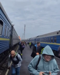 Shocking moment terrified passengers run for their lives as Russian drones ‘targeting Boris Johnson’s train’ rain down