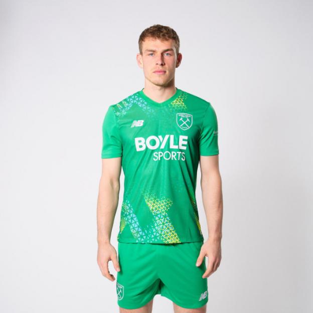 A man models a green goalie shirt and shorts with the "BOYLE SPORTS" logo.