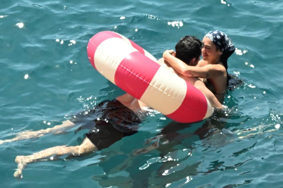 *PREMIUM-EXCLUSIVE* MUST CALL FOR PRICING BEFORE USAGE - Newlyweds Dua Lipa and Callum Turner looked every inch the loved-up couple as they soaked up the sunshine on the stunning Amalfi Coast during their romantic Italian honeymoon.