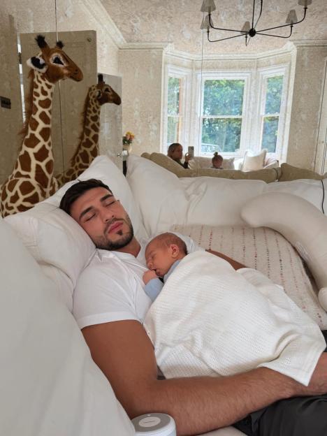 Molly-Mae Posts Heartwarming Photo of Tommy Fury and Son Midas Napping After Unveiling His Name at the Boxing Match