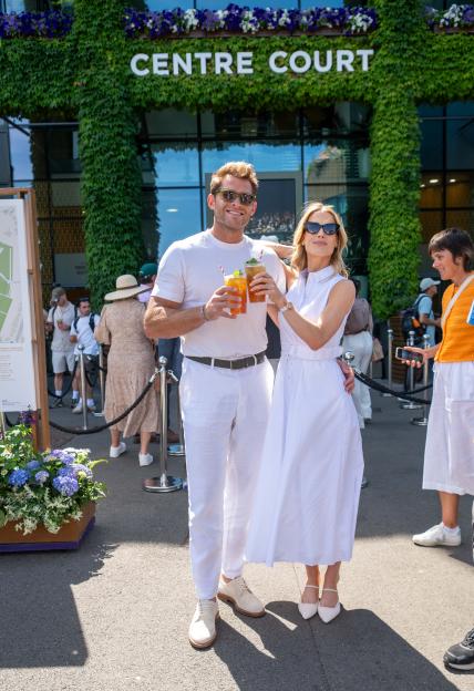 Gregg Mallett and Lady Amelia Spencer attend Wimbledon, holding Pimm's cups.
