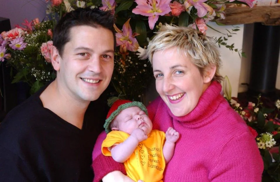 Julie Hesmondhalgh and Ian Kershaw with their baby, Martha Mo.