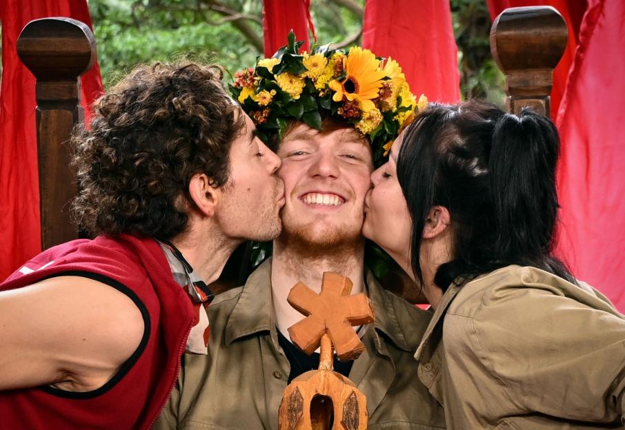 Angry Ginge is crowned King of the Jungle, with Tom Read Wilson and Shona McGarty kissing his cheeks.