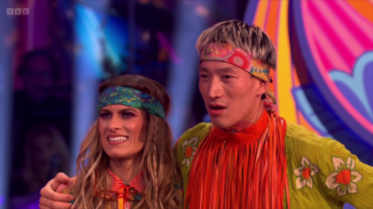 Strictly Come Dancing contestants dressed in 70s attire.