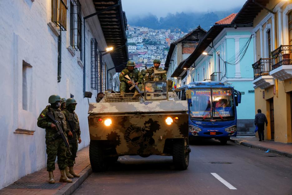 Security forces patrol after a violence outbreak, in Quito