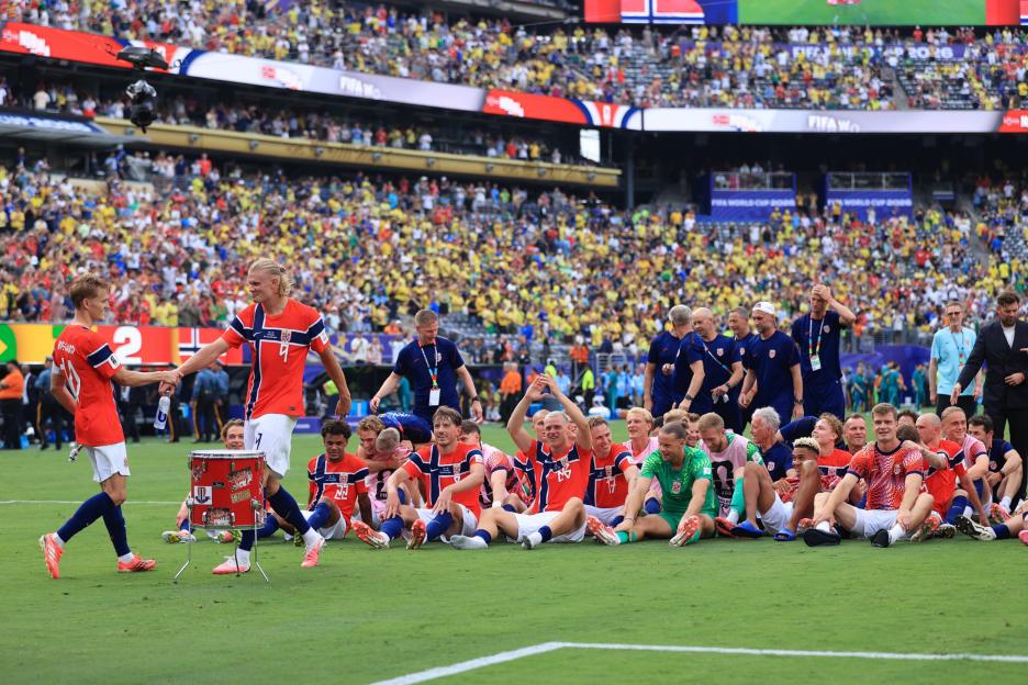 The Norway national football team sits on the field after the Brazil v Norway Round of 16 FIFA World Cup 2026 match.