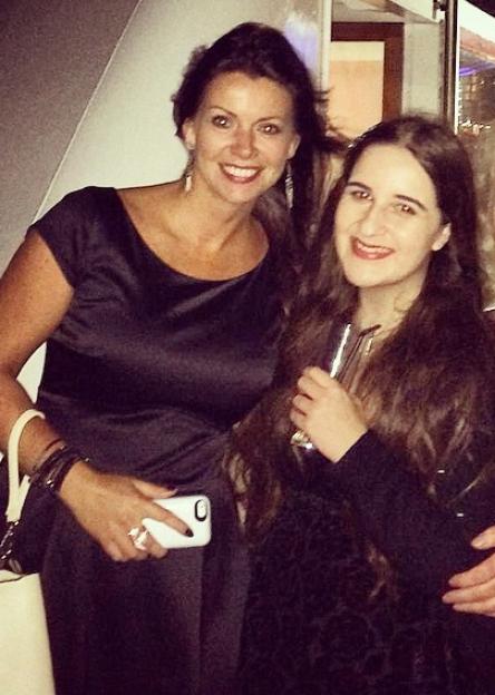 Anne Twist and Meg Bhagi smiling for a photo.