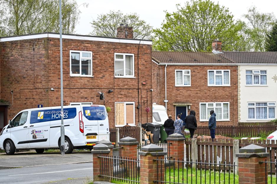 Woman, aged in her 70s, dies after being attacked by two dogs at house