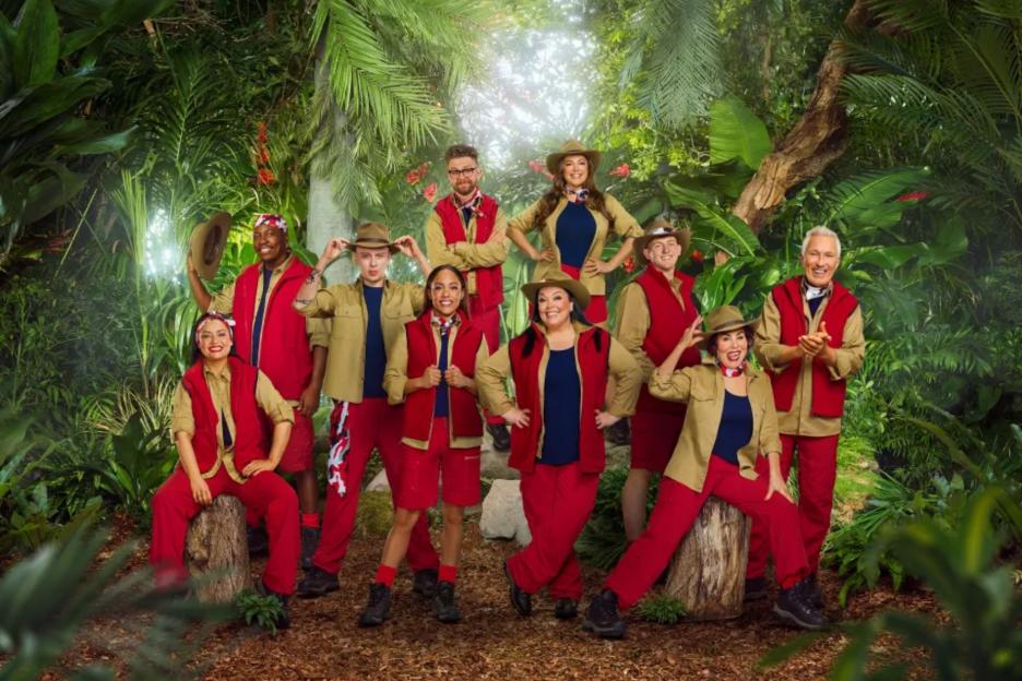 An image collage containing 1 images, Image 1 shows A group photo of Shona McGarty, Eddie Kadi, Aitch, Alex Scott MBE, Jack Osbourne, Lisa Riley, Kelly Brook, Angry Ginge, Ruby Wax OBE and Martin Kemp in a jungle setting for I'm A Celebrity... Get Me Out Of Here!