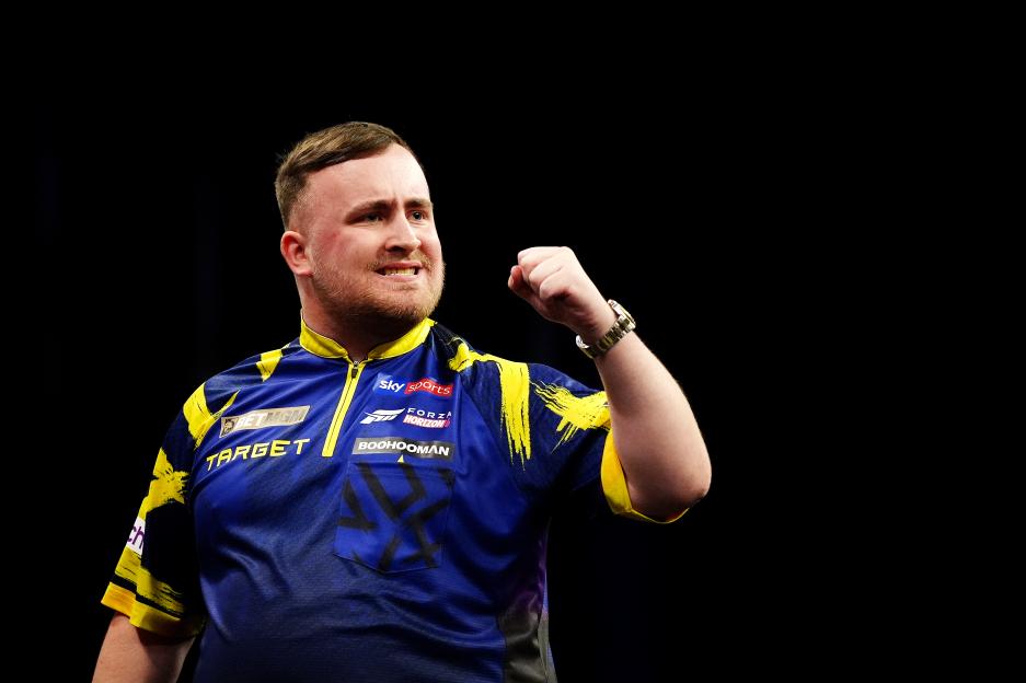 Luke Littler celebrating during his semi-final match.