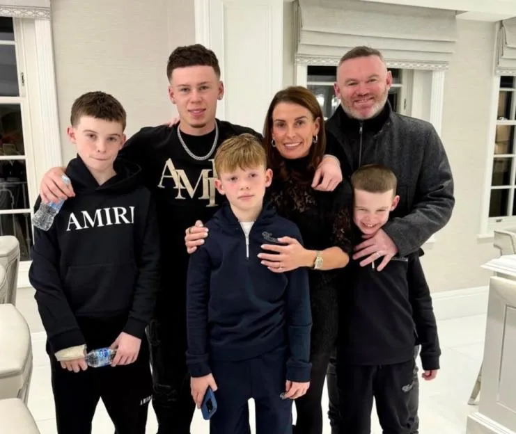 Wayne Rooney and wife Coleen with their four sons.