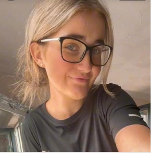Bonny Barrow, a young woman with glasses and blonde hair, smiling at the camera.