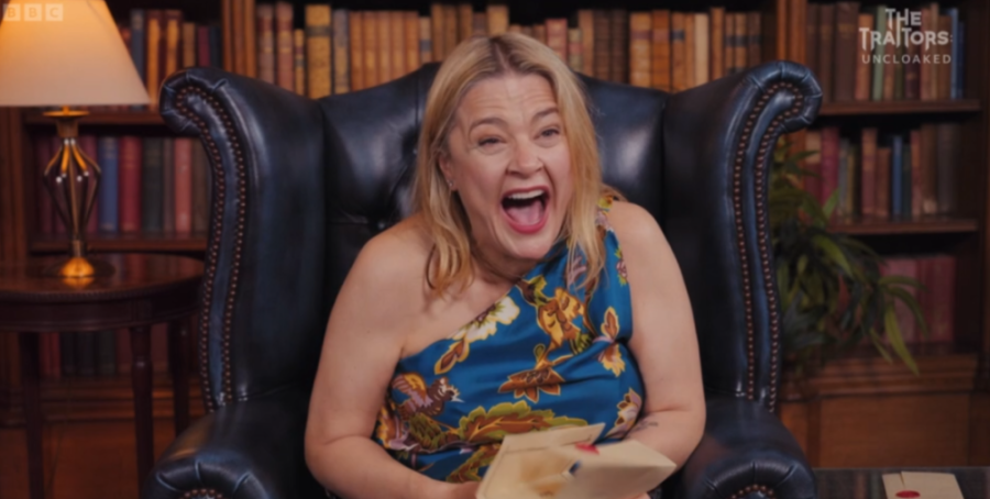 Harriett reacting in disbelief and surprise.