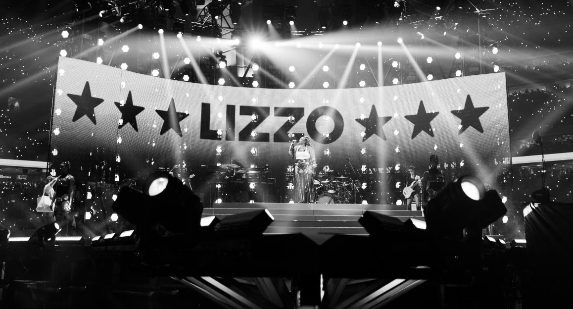 Lizzo performing on stage at the Houston Livestock Show and Rodeo.