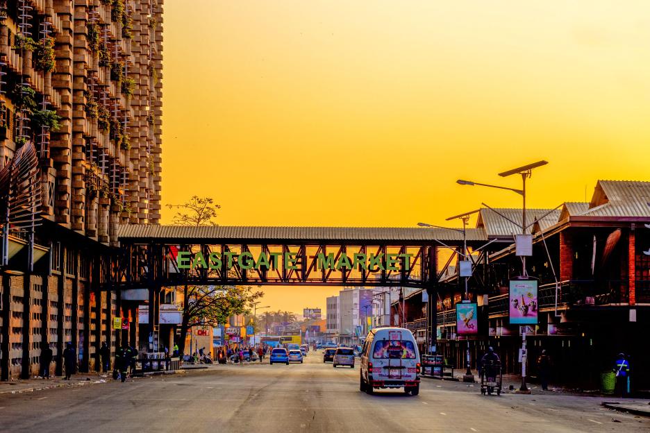 The Eastgate Mall in Harare, Zimbabwe, with the pedestrian bridge over a busy street.