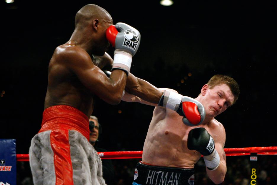 Floyd Mayweather lands a punch on Ricky Hatton's face.