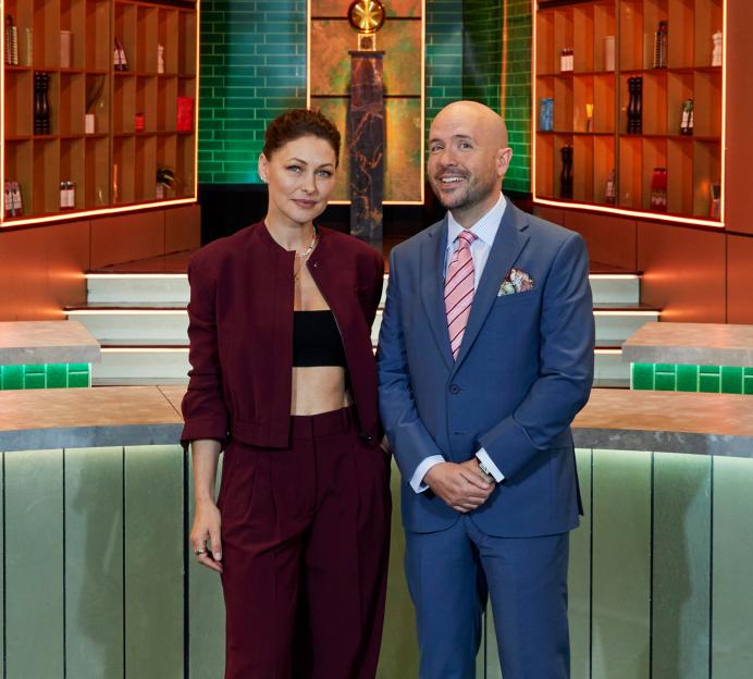 Emma Willis and Tom Allen standing in a kitchen studio.