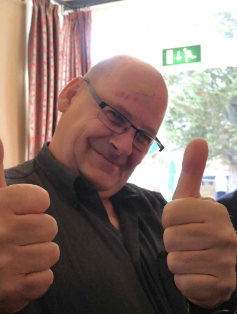 Simon Edney giving two thumbs up.