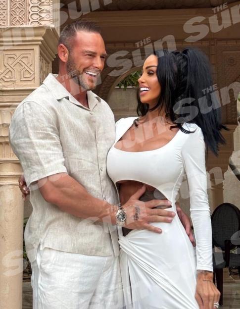 Katie Price and Lee Andrews embracing after their wedding in Dubai.
