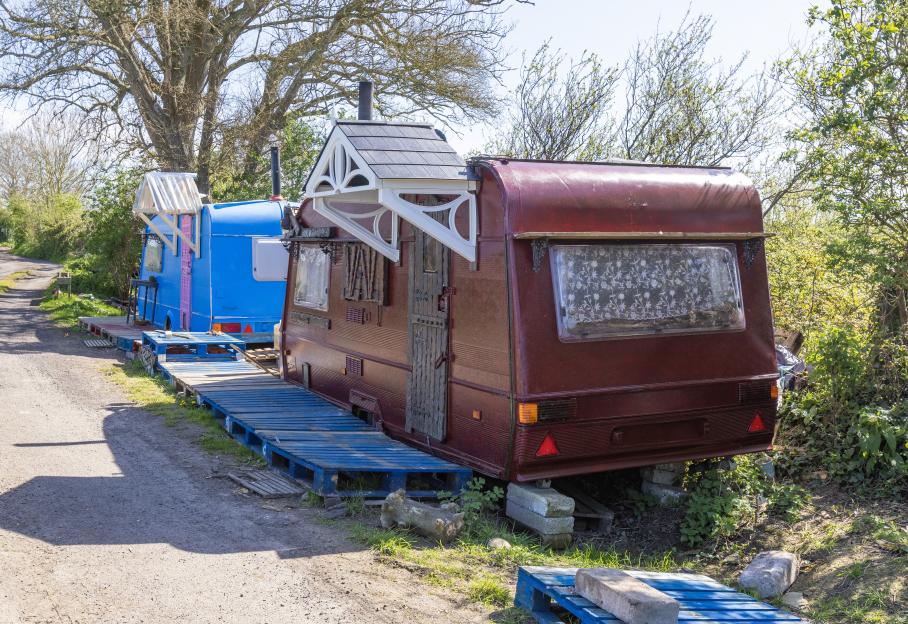 Caravans parked on Kennard Moor Drove in Glastonbury.