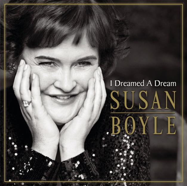 Susan Boyle's "I Dreamed A Dream" album cover, featuring her smiling with her hands to her face.