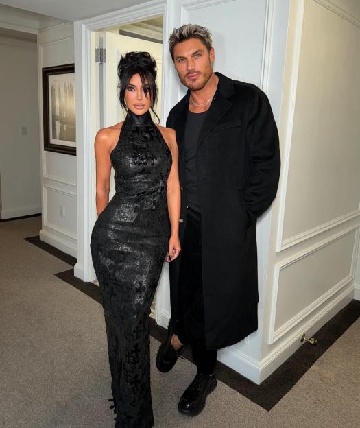 Kim Kardashian and Chris Appleton posing.