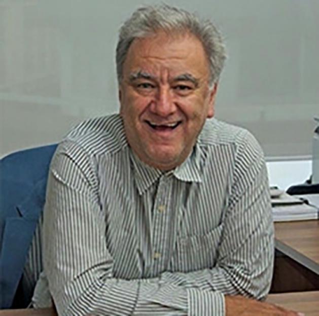 Colin Newman, accountant, executive producer, manager, publisher, and record company owner, smiling.