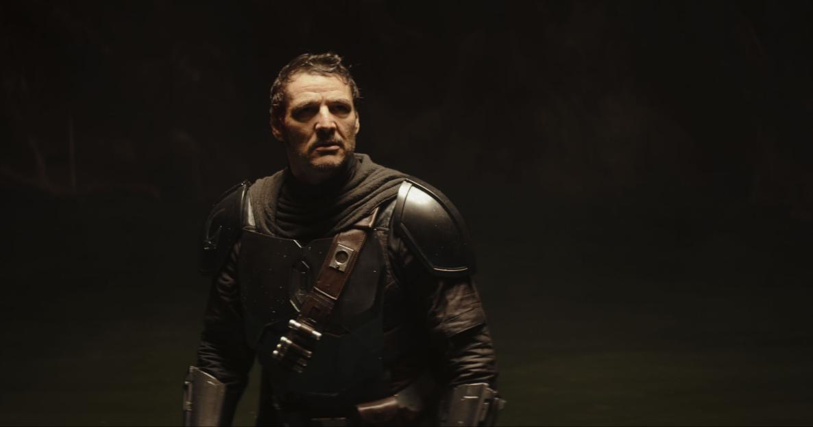 Pedro Pascal as The Mandalorian in his signature armor, with his helmet off.