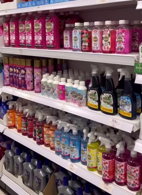 Shelves in a store filled with various Fabulosa cleaning products, including all-purpose cleaners, disinfectant cleansers, air fresheners, and fabric refreshers, all priced at 99p.