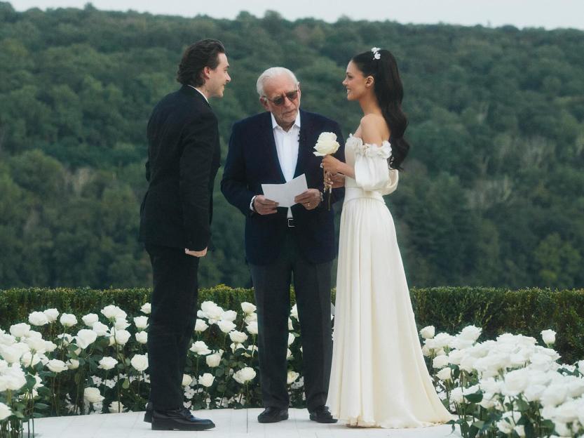 Brooklyn and Nicola Beckham renewing their vows with Nicola's father, Nelson Peltz, officiating.