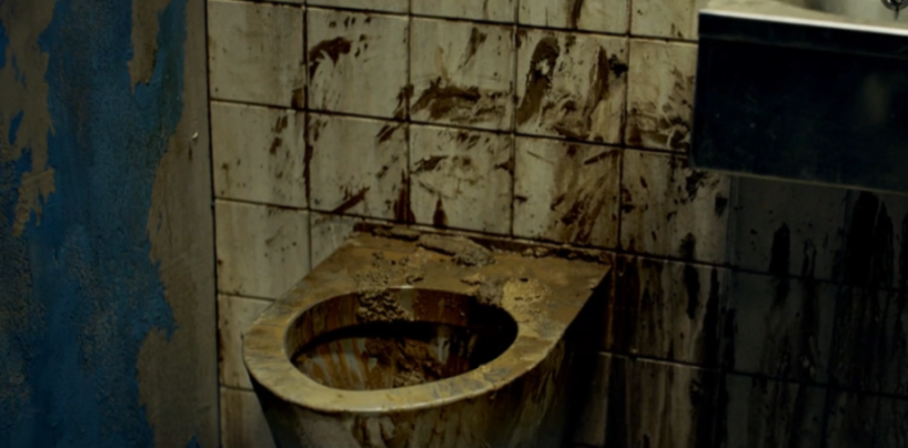 Reconstruction of a dirty and unhygienic Dubai prison toilet.