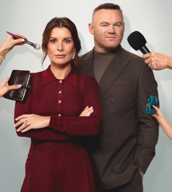 Publicity image for "The Real Rooneys" featuring Coleen and Wayne Rooney surrounded by hands holding objects representing different aspects of their lives.