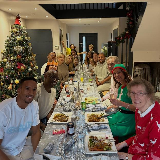 Scott Sinclair and Helen Flanagan's children pose with family at a Christmas meal.
