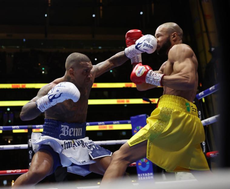 Chris Eubank Jr. and Conor Benn boxing in the ring.