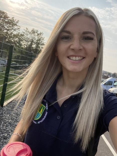 Bronwen James, 29, in a dark blue polo shirt.