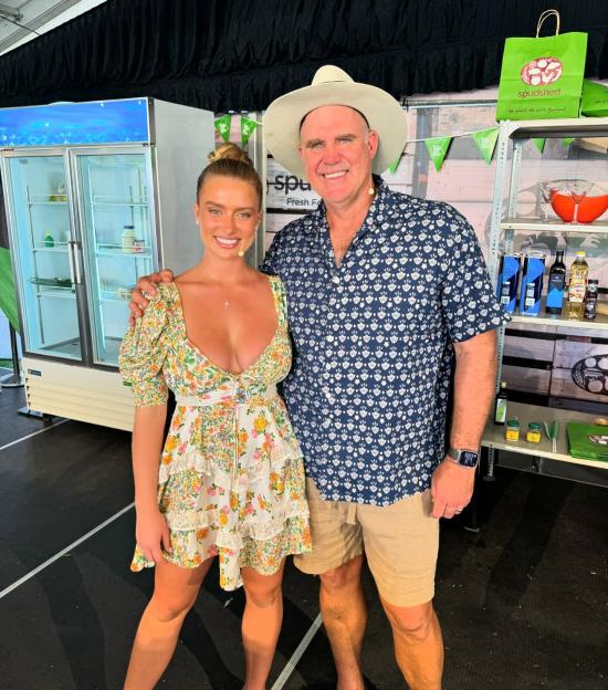 Photo of a man and woman standing together.