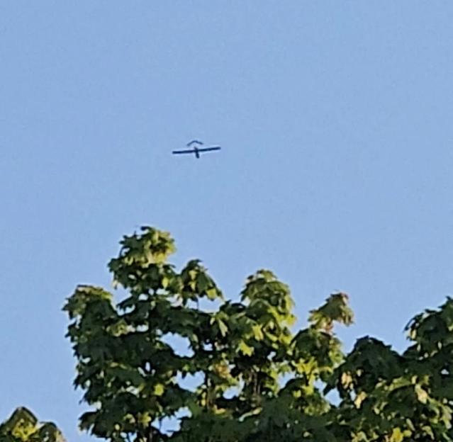 : Aircraft flies over a village, after the Latvian military said a drone had entered the country's airspace, in Kubulova