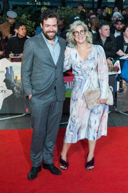 Anna Whitehouse holding her child while sharing divorce news.