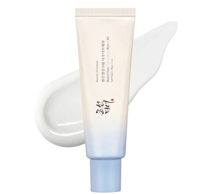 Tube of Beauty of Joseon Relief Sun: Aquafresh Rice + B5 SPF50+ PA++++ sunscreen with swatches of the product on a white background.
