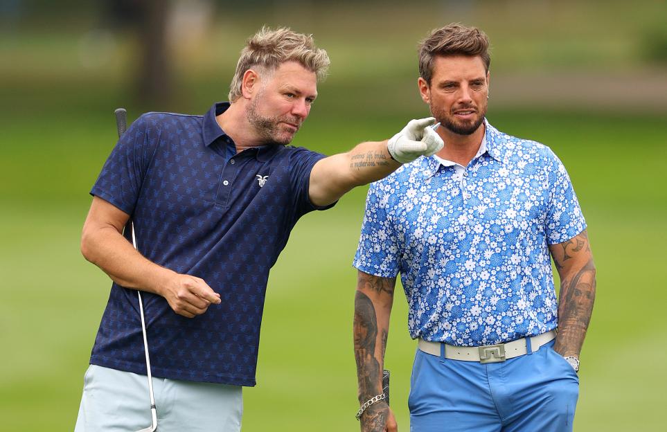 Brian McFadden (left) and Keith Duffy (right) playing golf on the 18th hole.