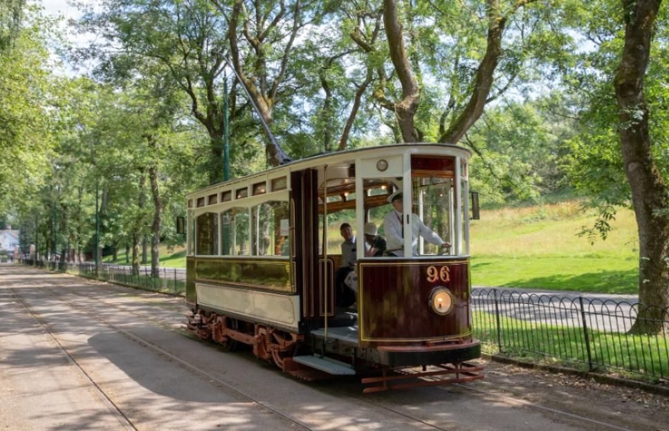 Heaton Park Tramway tram car 96 with a driver and passengers.