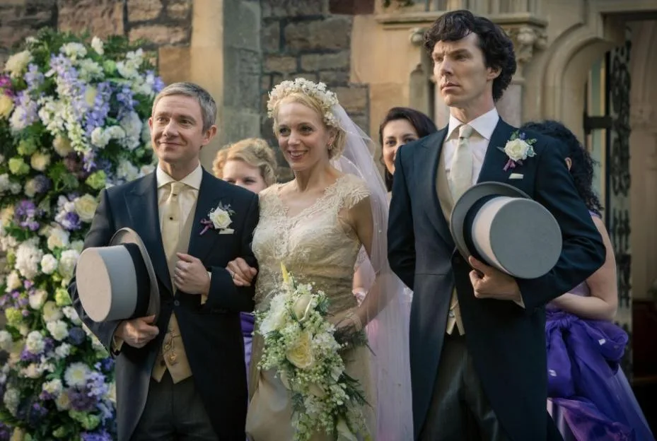 Martin Freeman, Amanda Abbington, and Benedict Cumberbatch in a scene from 'Sherlock'.
