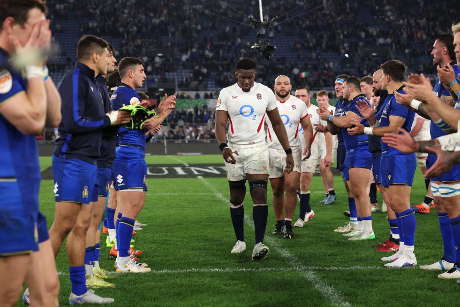 England's Maro Itoje looks dejected as he walks past Italian players following the Guinness Six Nations 2026 match.