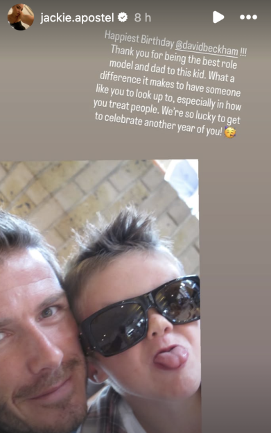 A man taking a selfie with a child in sunglasses sticking out their tongue.