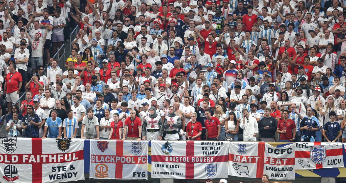 England and Argentina football fans in the stands during a semi-final match.