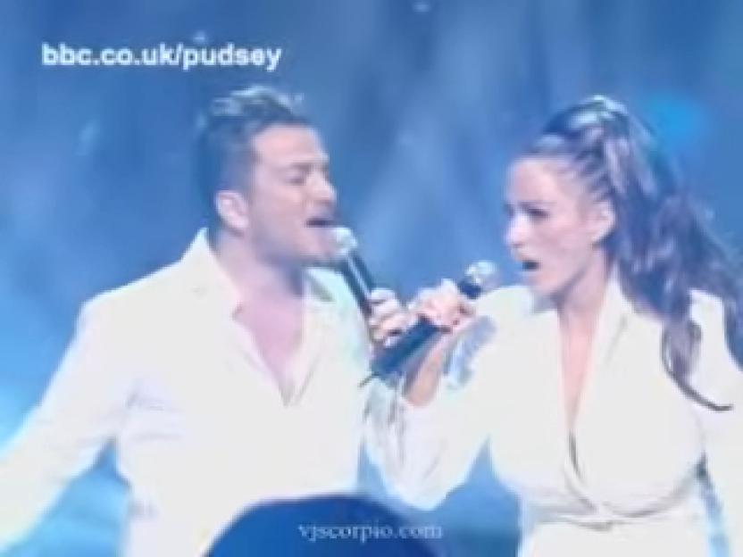 Katie Price and Peter Andre singing "A Whole New World" for BBC's Children in Need.